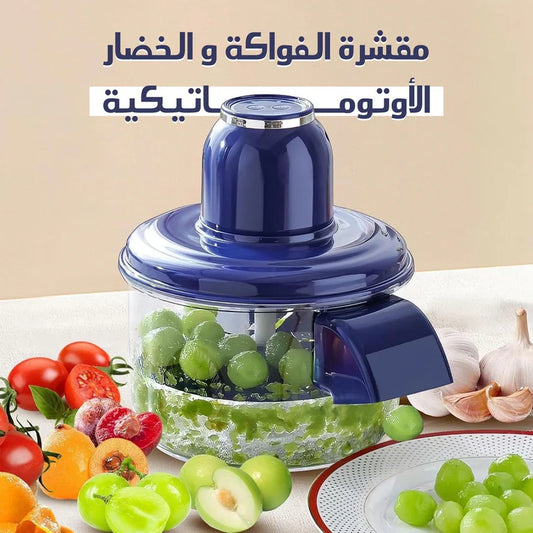 Urbian Burj automatic kitchen garlic, fruit, and vegetable peeler on a countertop, showcasing its compact design and peeling mechanism.