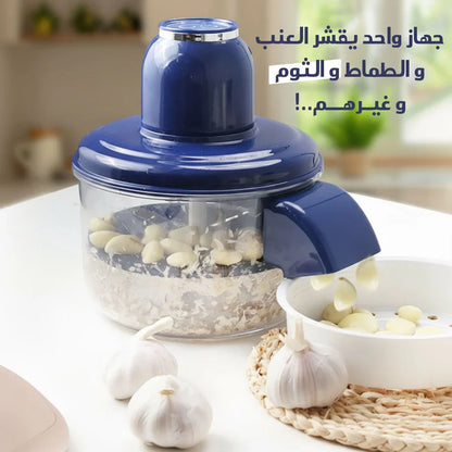 Urbian Burj automatic garlic, fruit, and vegetable peeler in a kitchen setting, showing the compact, easy-to-use peeler device.