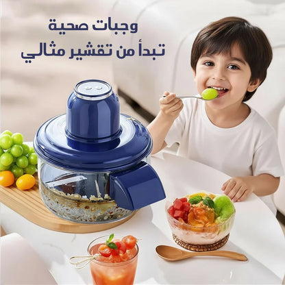 Urbian Burj automatic garlic, fruit, and vegetable peeler in a kitchen setting, showcasing its compact design and peeling mechanism.